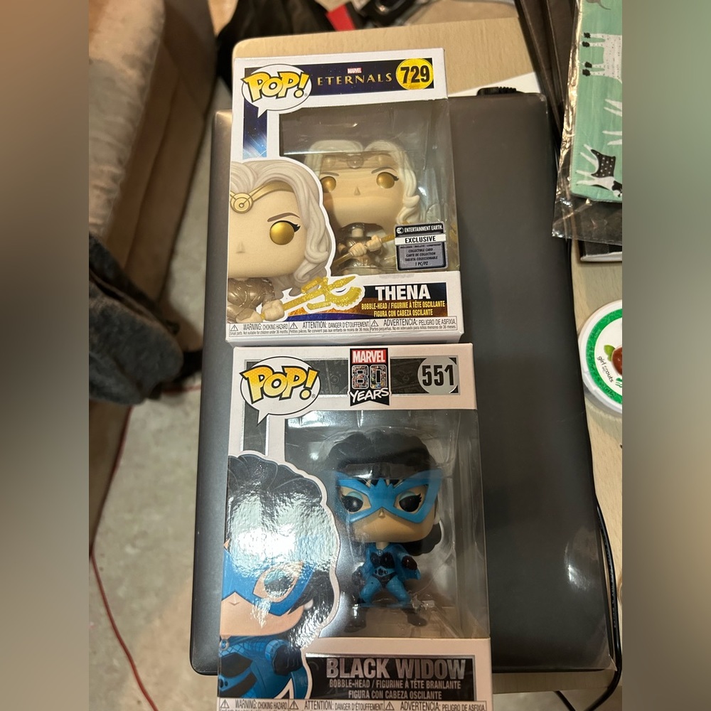 New in box Two Funko Pop figurines, Black Widow Marvel and Thena from Eternals